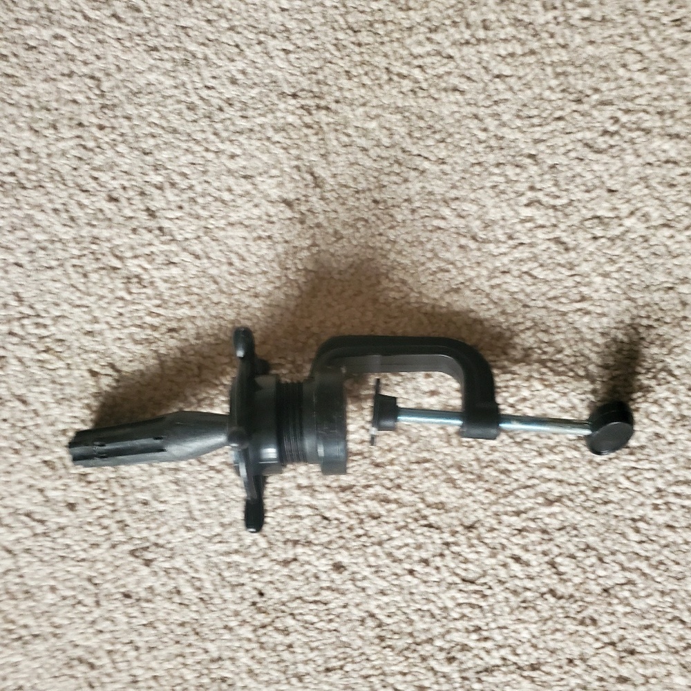 Manikin stand for cosmetology hand or head.